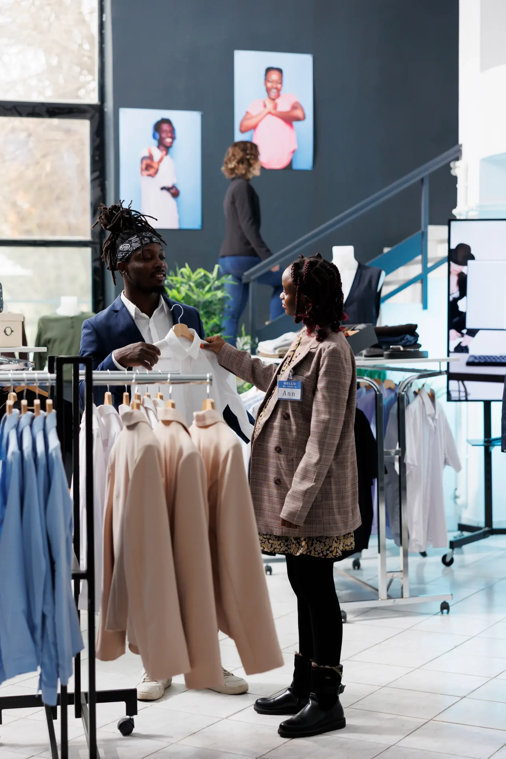 boutique-worker-helping-stylish-customer-2026-01-08-02-29-43-utc