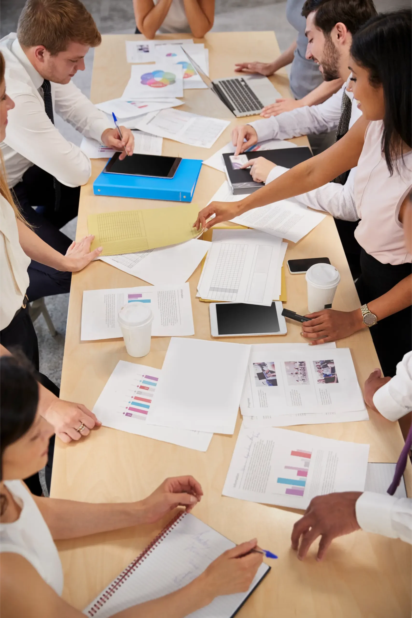 business-group-brainstorming-at-a-table-elevated-2026-01-05-06-34-51-utc
