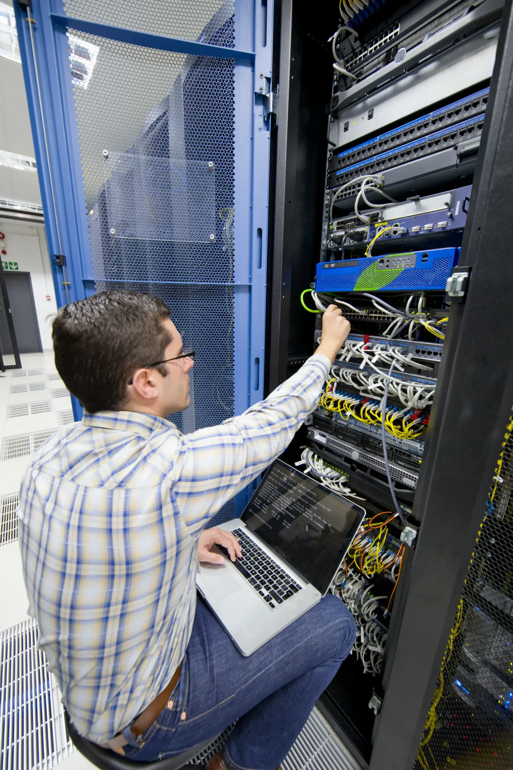 close-up-of-a-technician-sitting-on-a-moving-chair-2026-03-26-08-57-43-utc