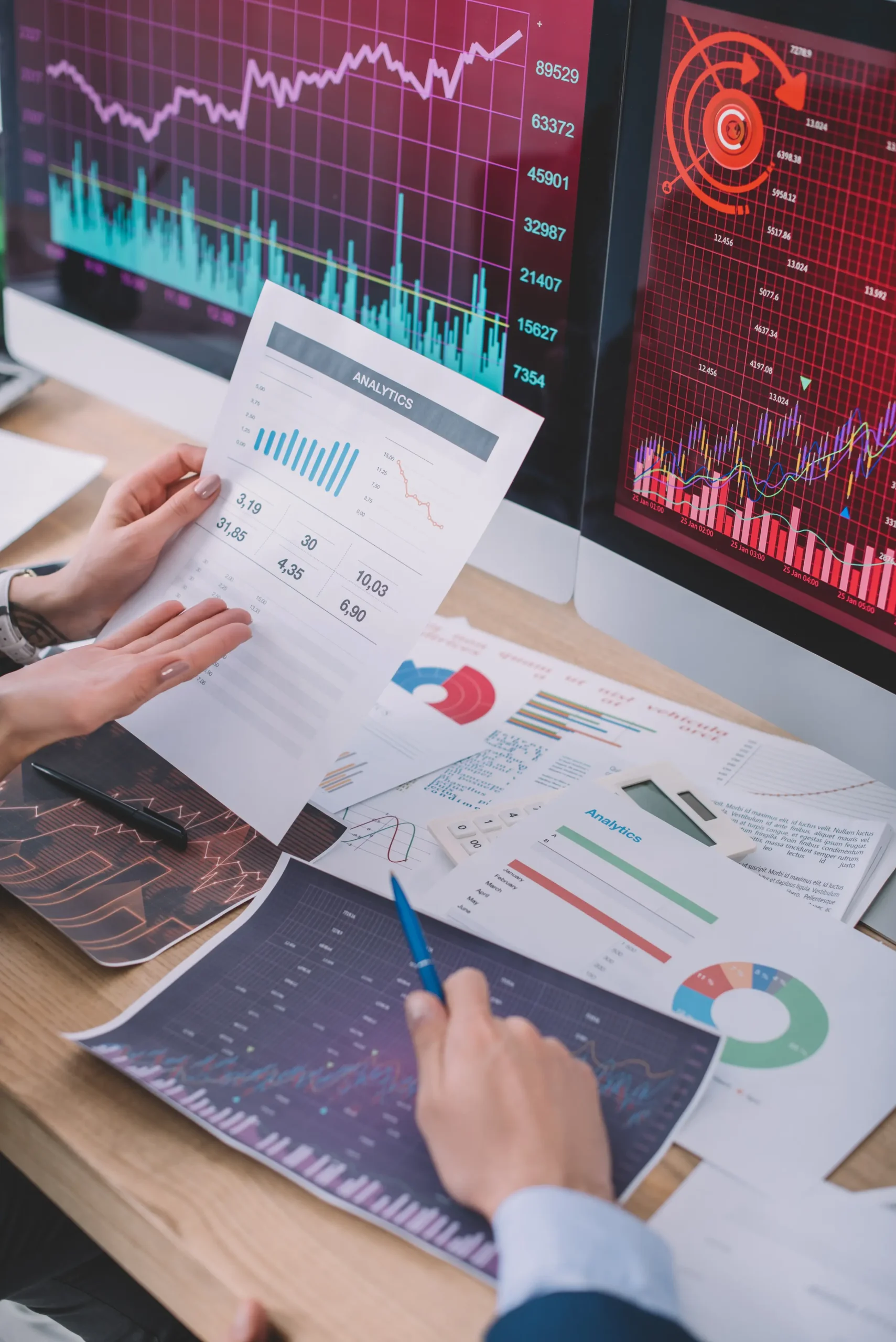 cropped-view-of-data-analysts-using-charts-while-d-2026-01-06-00-29-49-utc