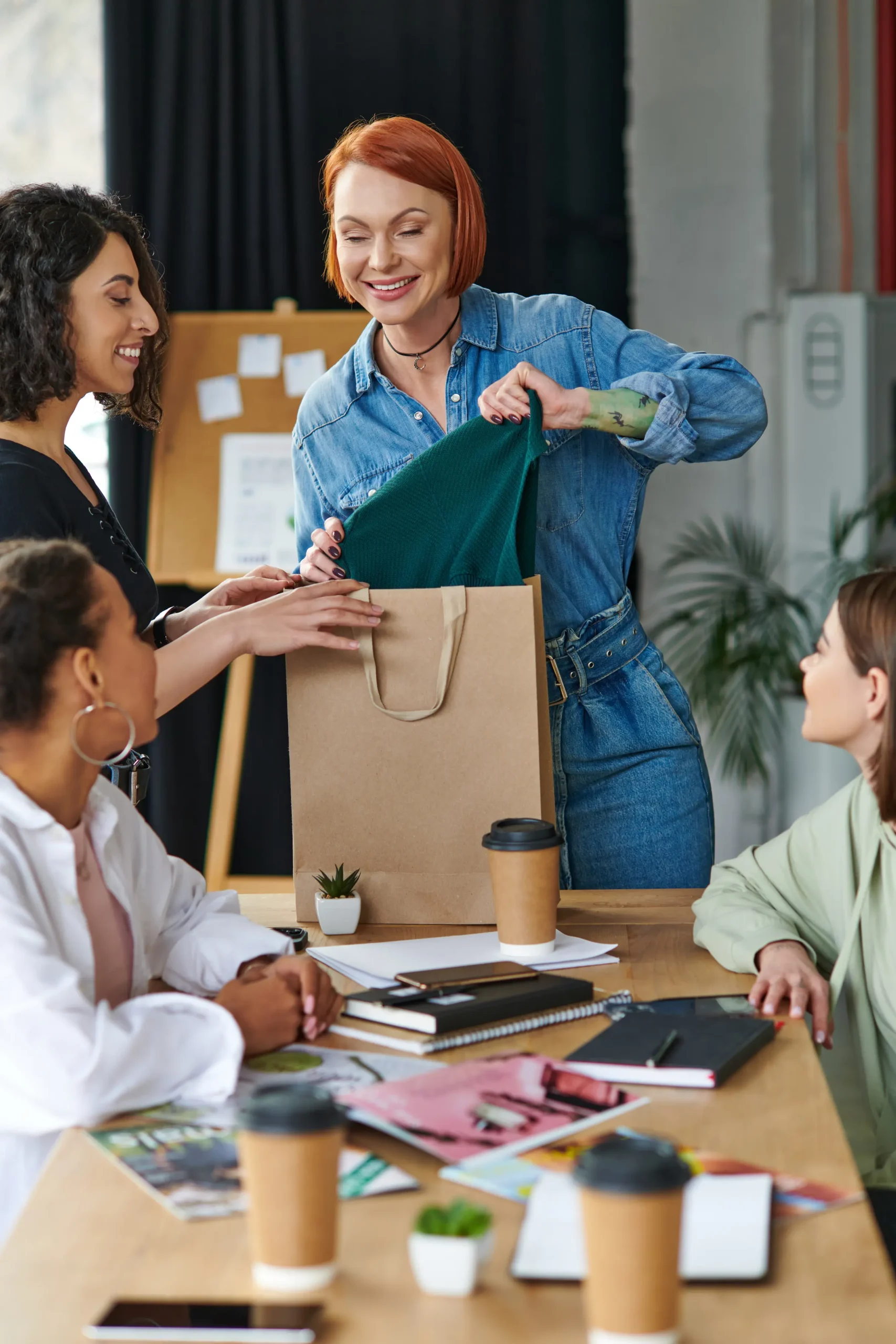 happy-colleagues-opening-present-in-workplace-2026-01-05-23-43-03-utc