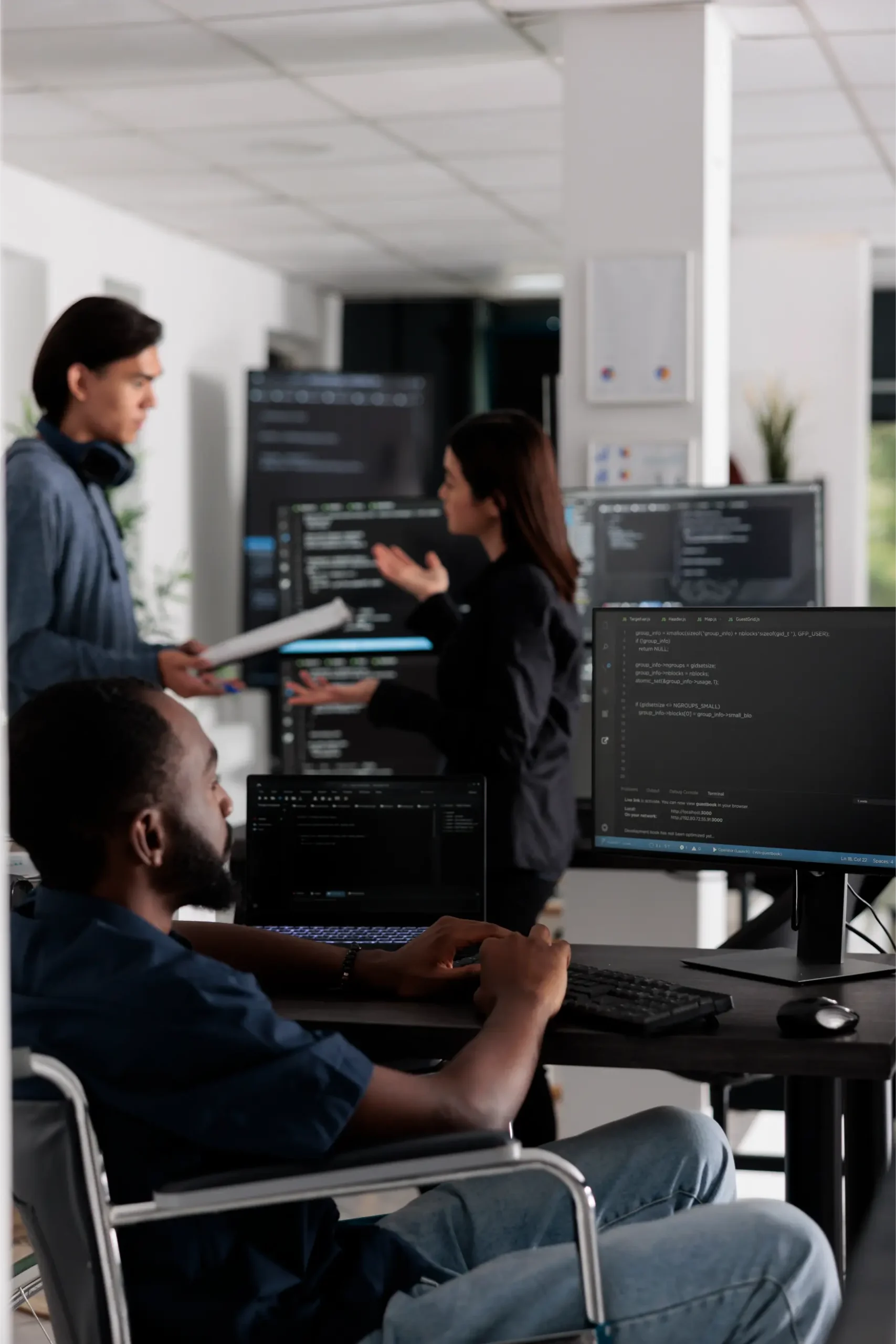 it-programmer-in-wheelchair-typing-html-code-in-co-2026-01-08-02-26-29-utc