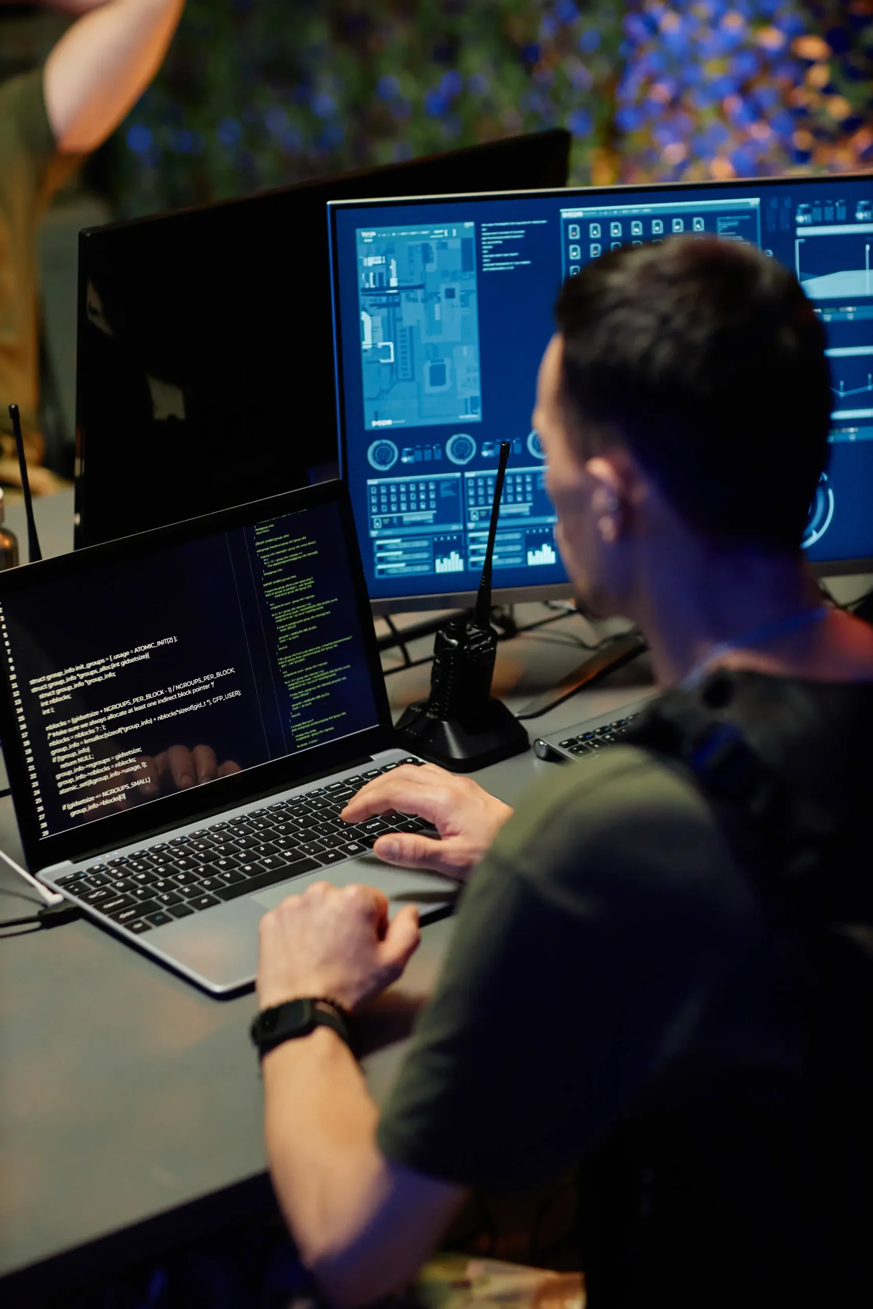 man-works-at-computer-with-code-on-screen-2026-03-20-04-30-02-utc