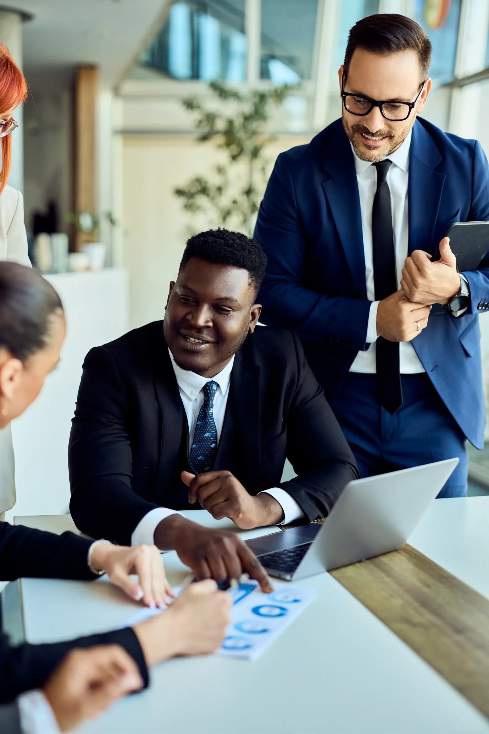 professional-team-discussing-business-plans-in-a-m-2026-04-01-17-29-25-utc