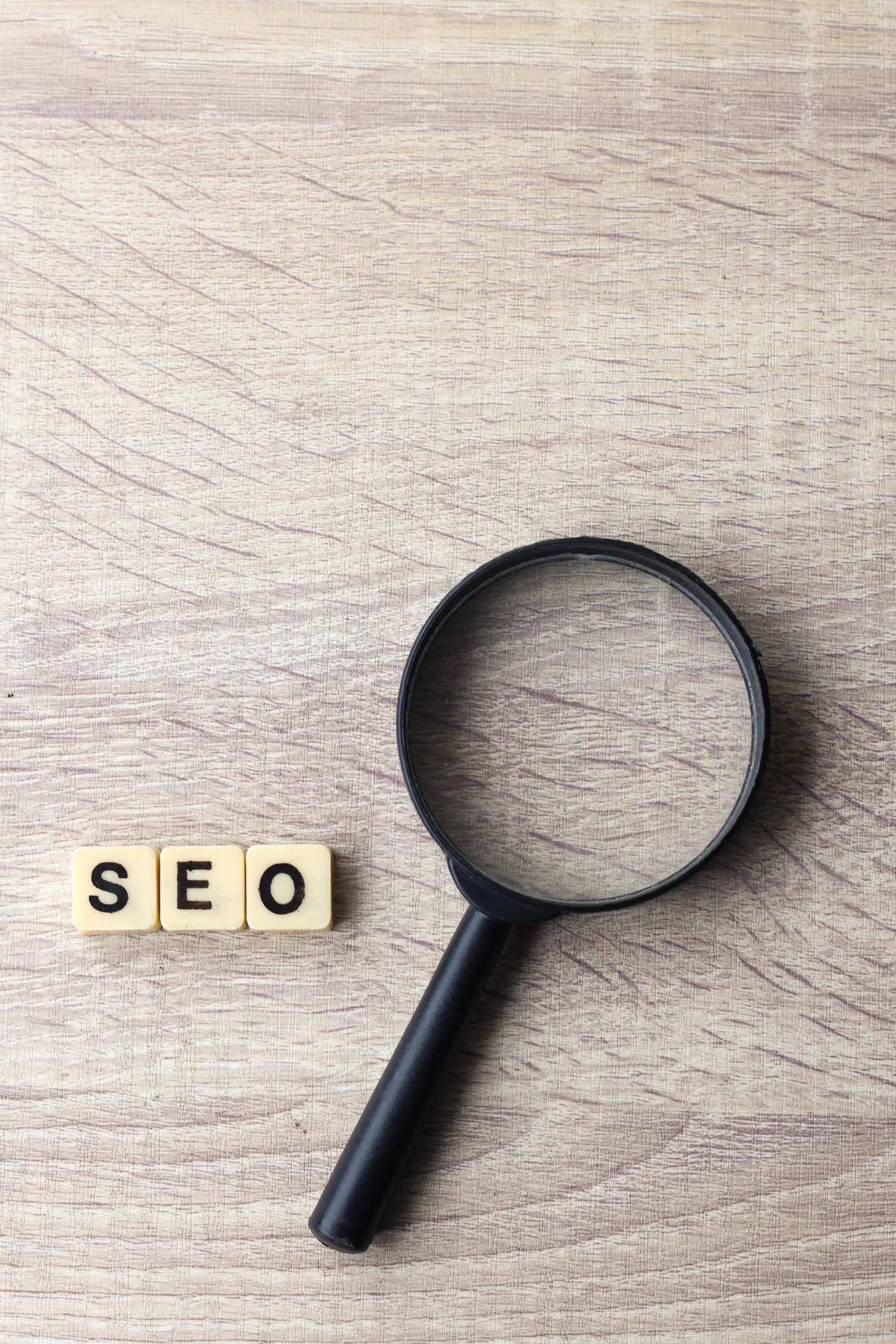 seo-search-magnifying-on-wooden-background-2026-01-09-08-20-16-utc